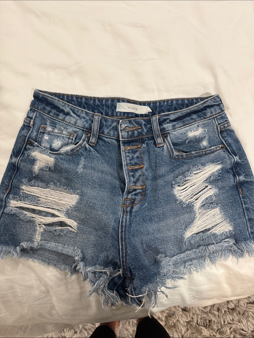 High-Rise Distressed Jean Shorts in Blue by Hidden
